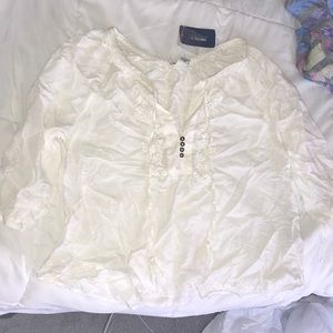 A white flowery top that has never been worn